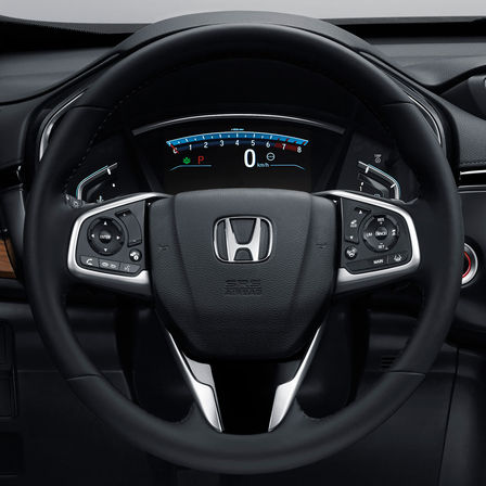 Vue rapprochée du volant multi-fonctions du Honda CR-V.