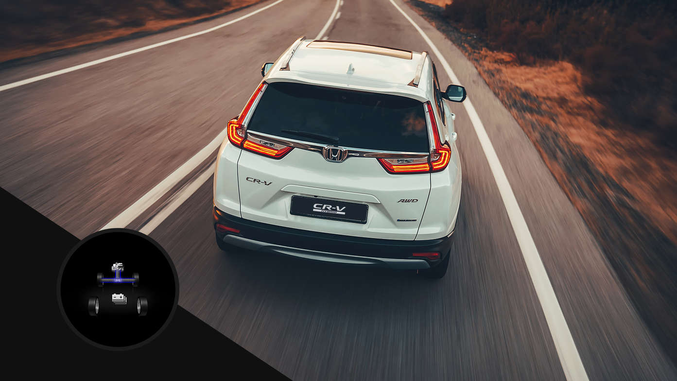 Vue arrière du Honda CR-V Hybrid en ville.