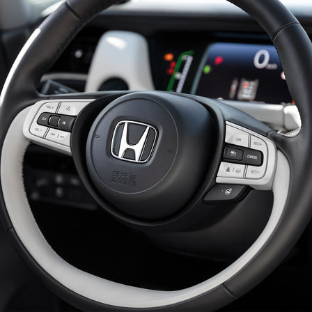 Gros plan sur le volant de la Honda Jazz