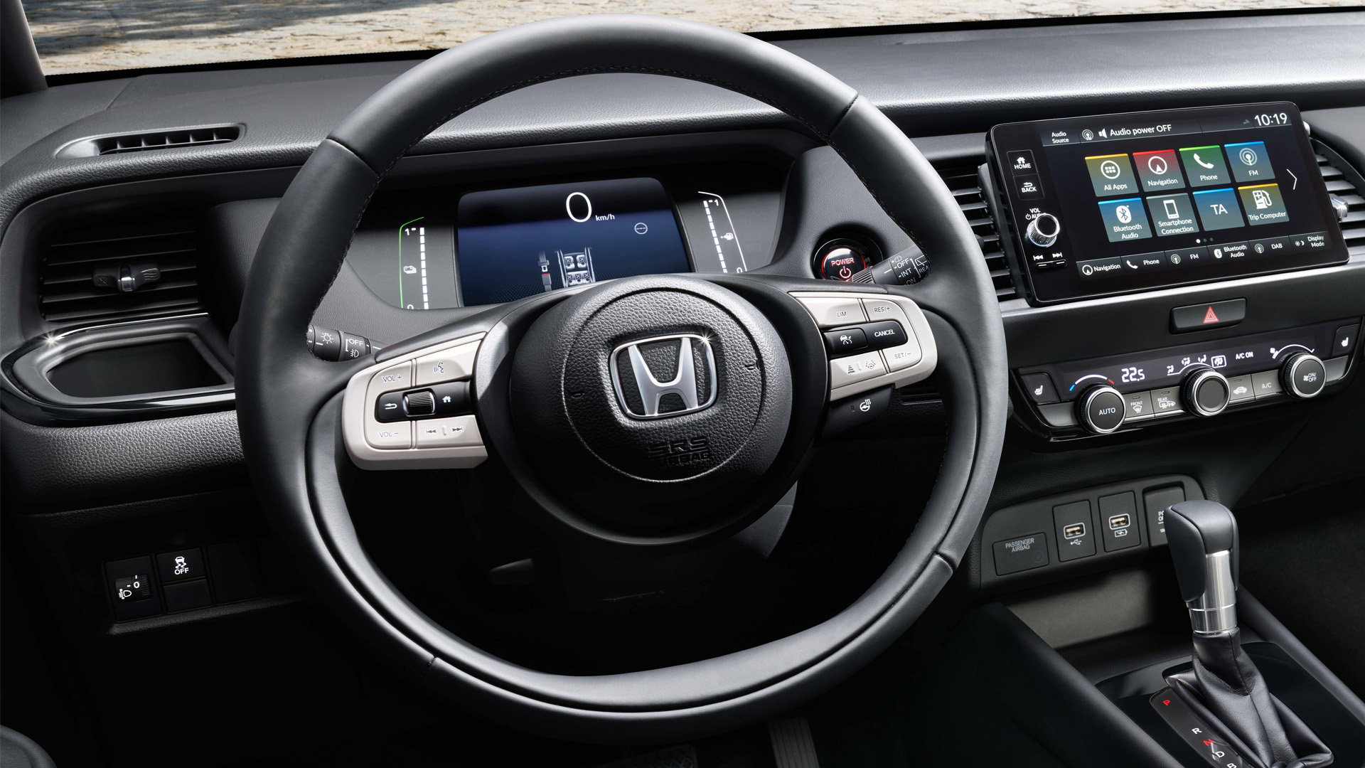 Gros plan sur le bouton de mode de conduite de la Honda Jazz.