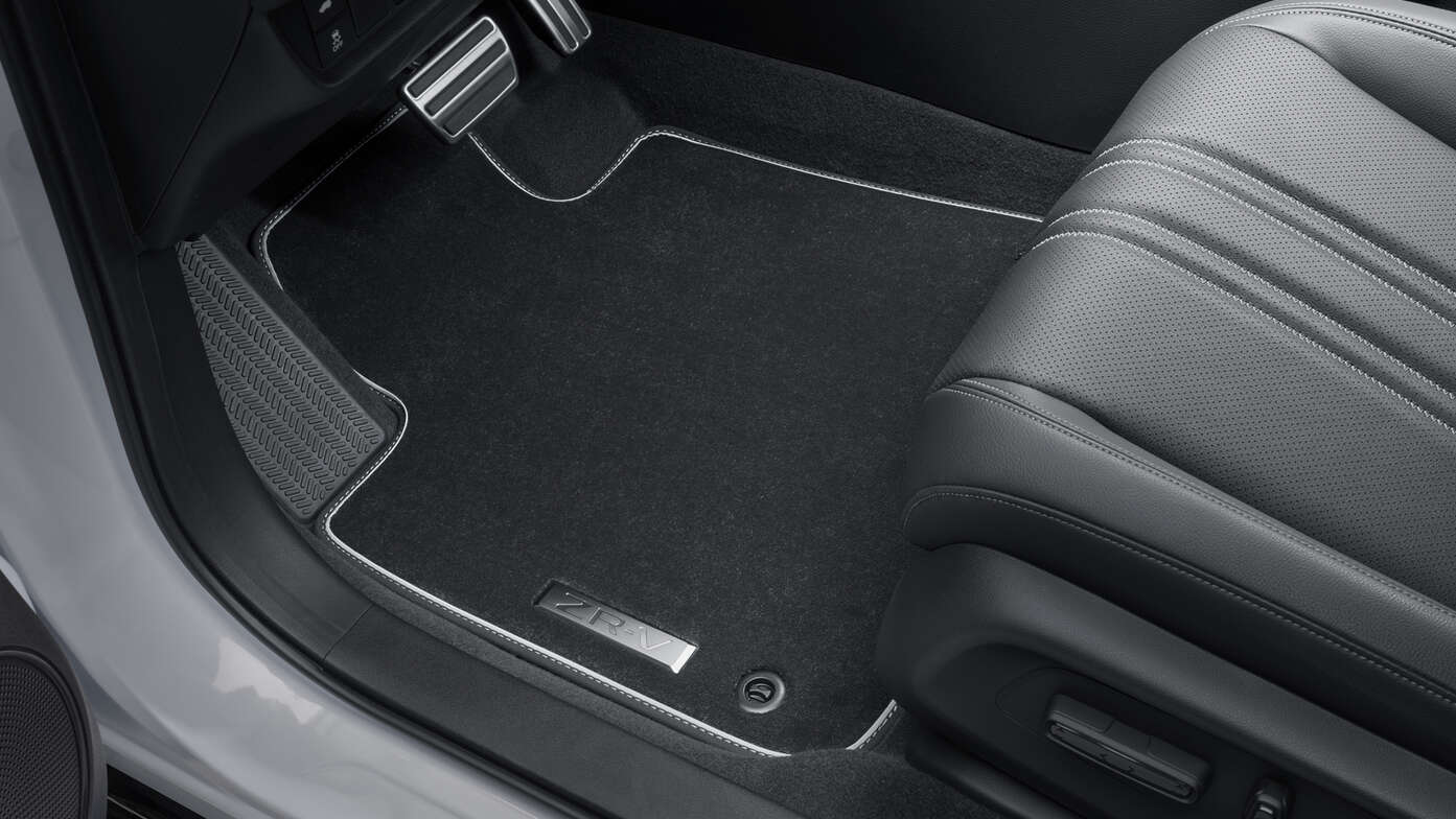 Gros plans de tapis de voiture Premium en voiture