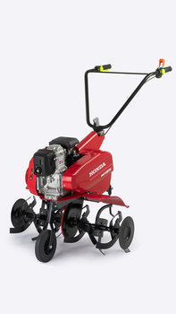 Motobineuse compacte de trois quarts face, tourn&eacute;e vers la gauche.