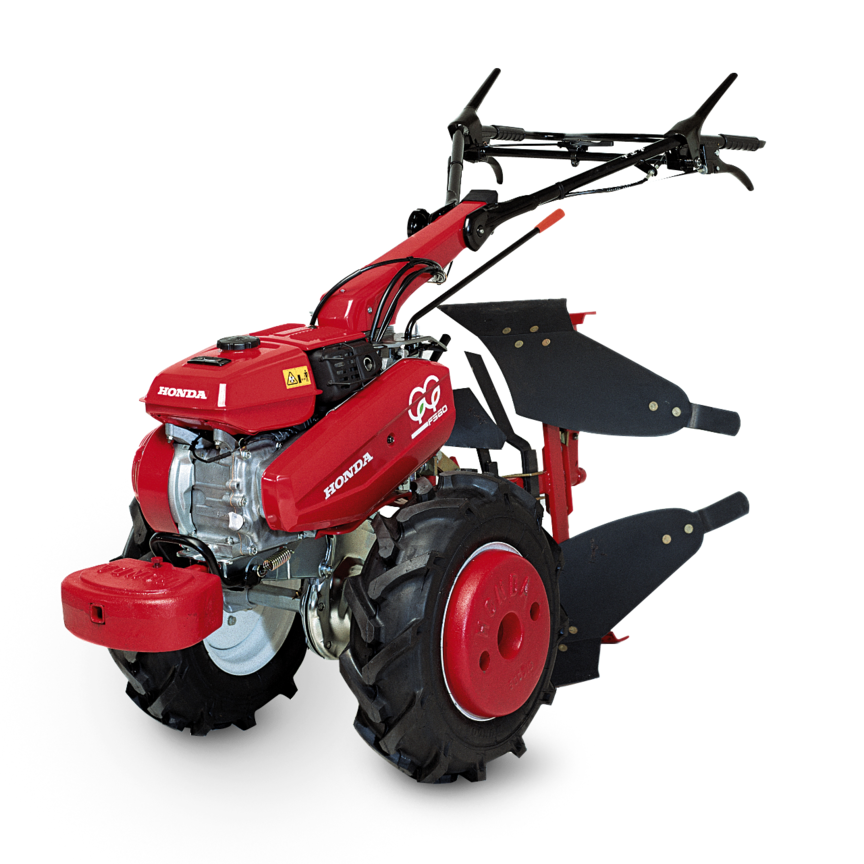 Deux motoculteurs transformables Honda, de trois quarts face, tournés vers la gauche.
