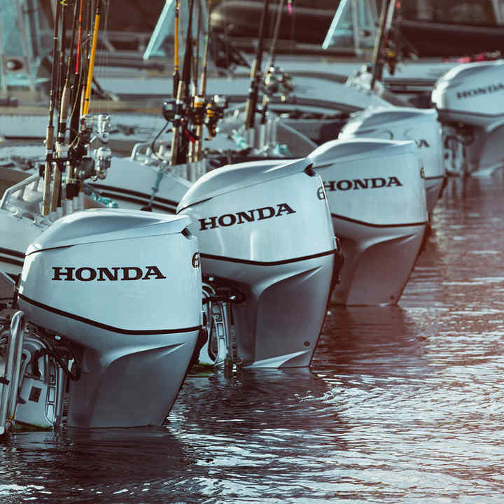 A row of boats all with Honda BF60 engines.