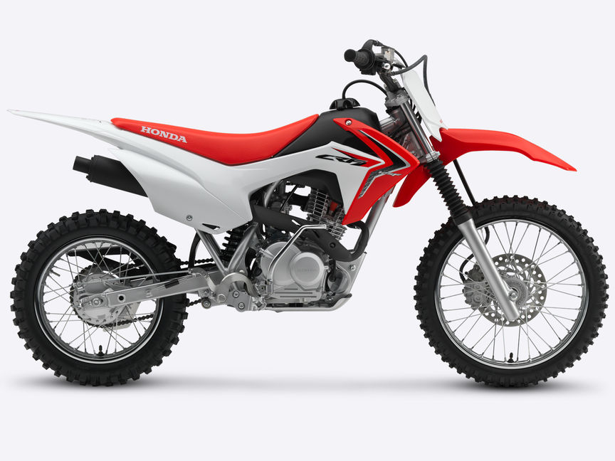 Vue latérale, côté droit d'une CRF125F rouge.